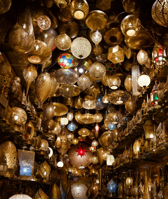 several balls and lamps are hanging from the ceiling