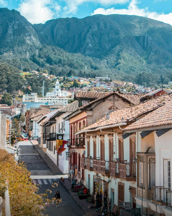 an overview of town with mountain scenery behind it