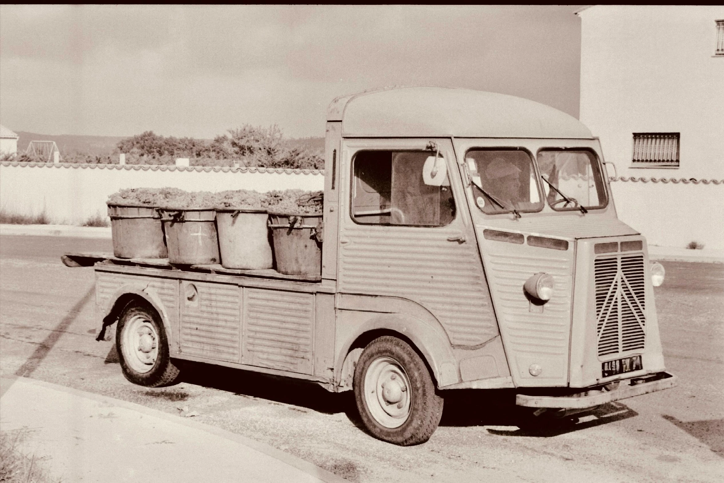 a truck is parked in front of a building