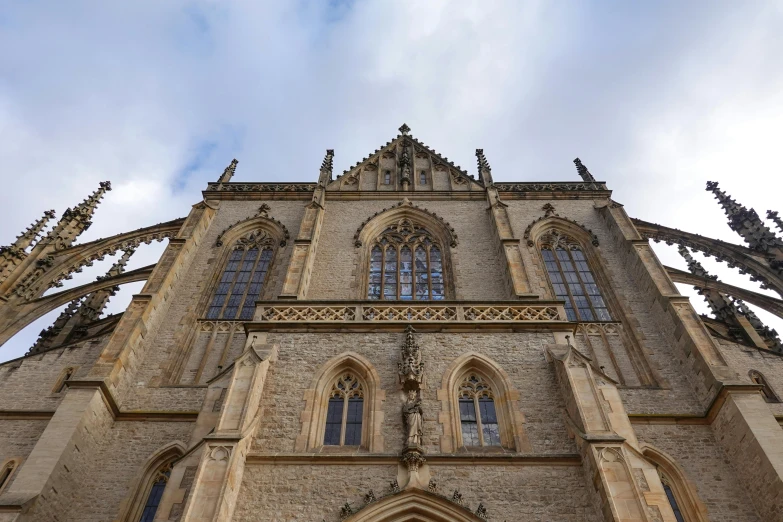 large cathedral with intricate gothic windows and roof