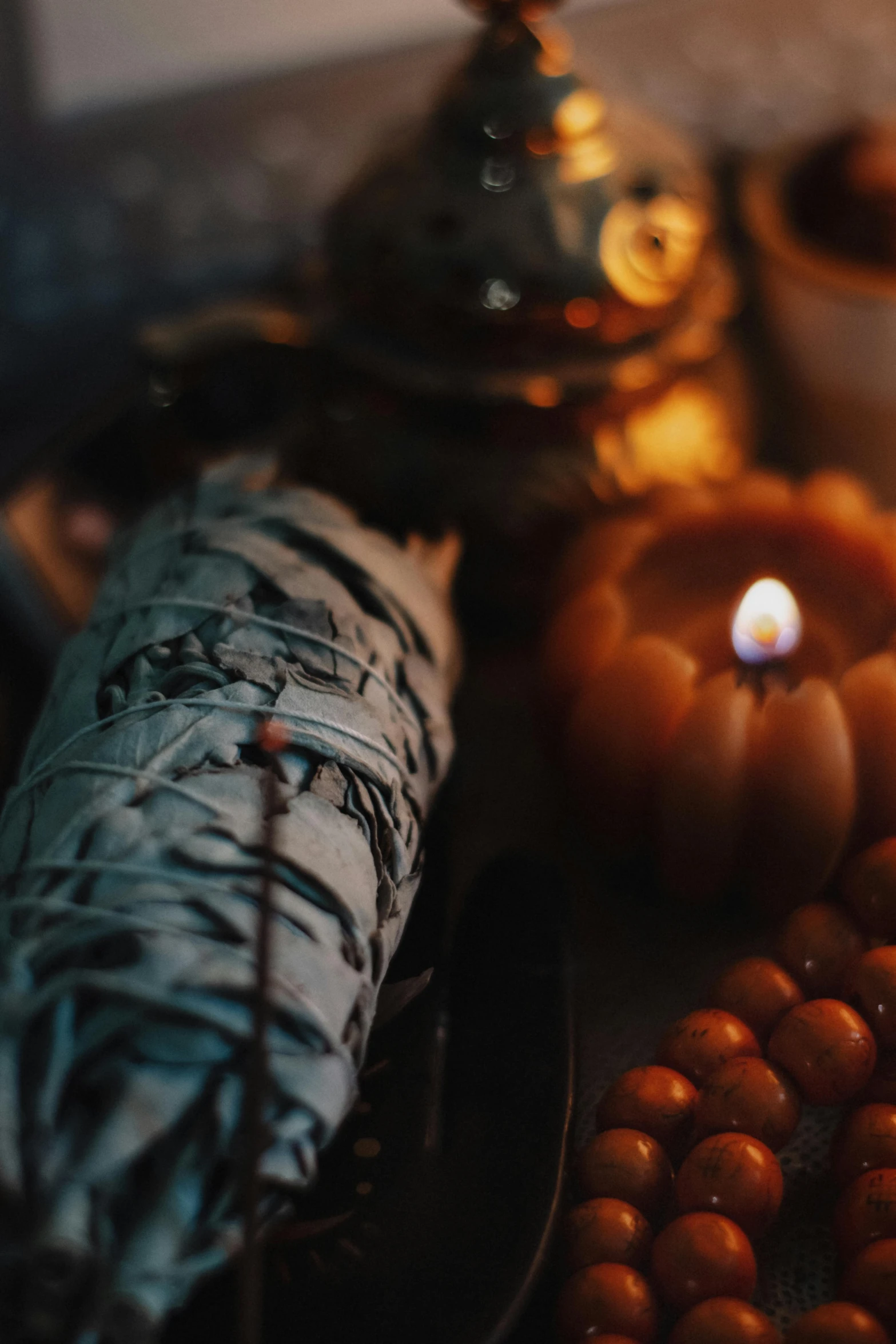 an assortment of candle lit pumpkins in the background