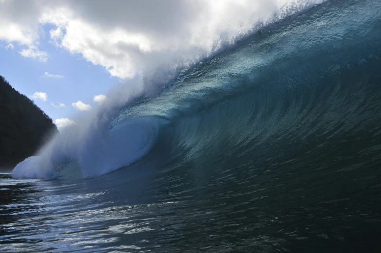 a person riding a wave in the ocean