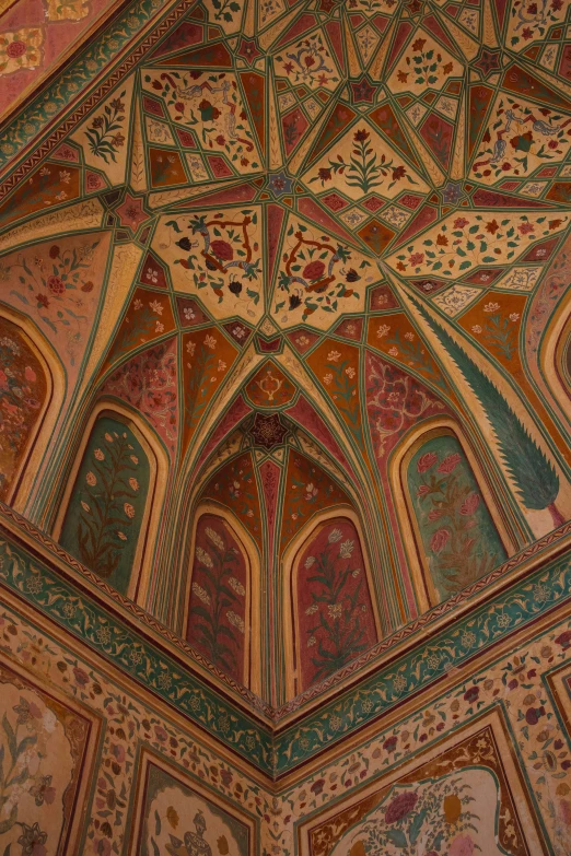 an intricate and detailed ceiling in the building