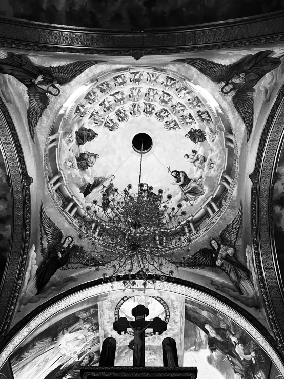 a very tall cross in a black and white po