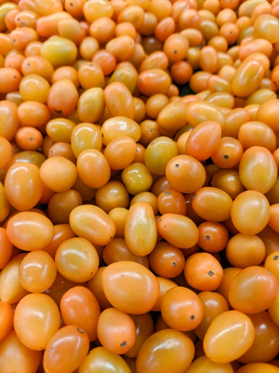 close up image of some kind of orange fruit