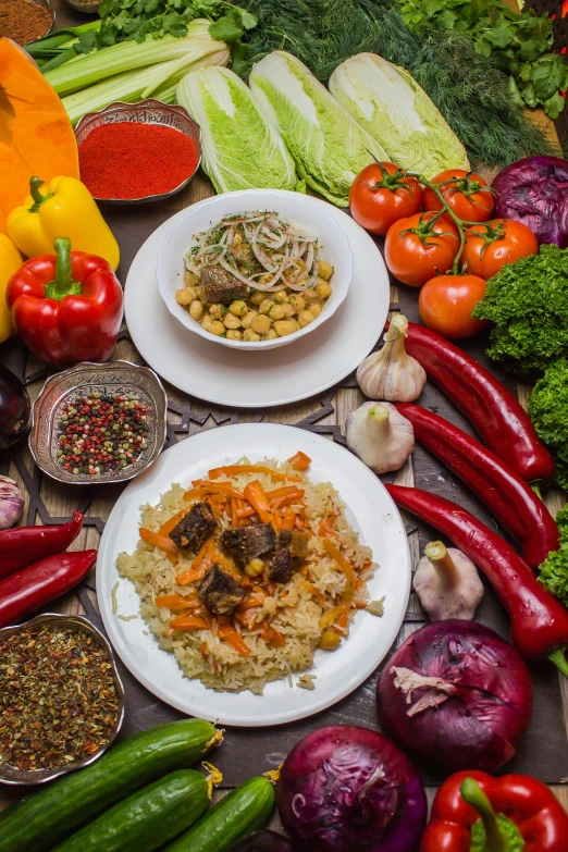 multiple plates filled with various types of food