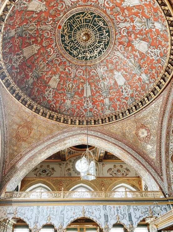 a view looking up from the ceiling of the inside of a building