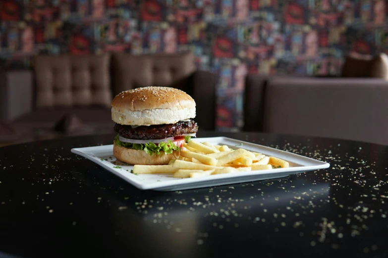 a cheeseburger and fries are sitting on a plate