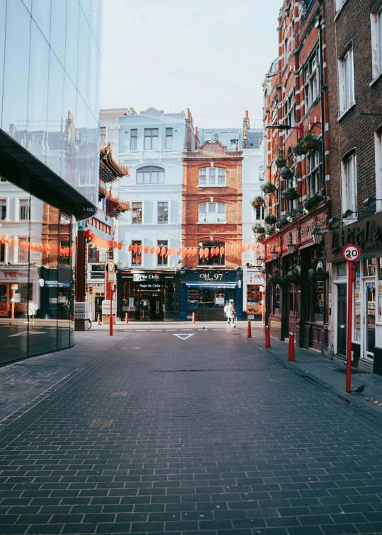 a city street with an outdoor seating area