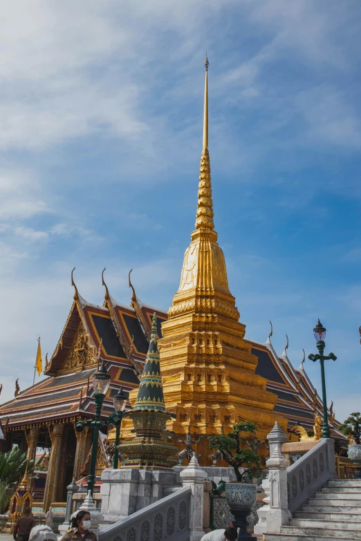 an outdoor area with many golden buildings