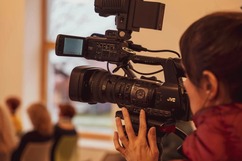 a person with a camera on the ground