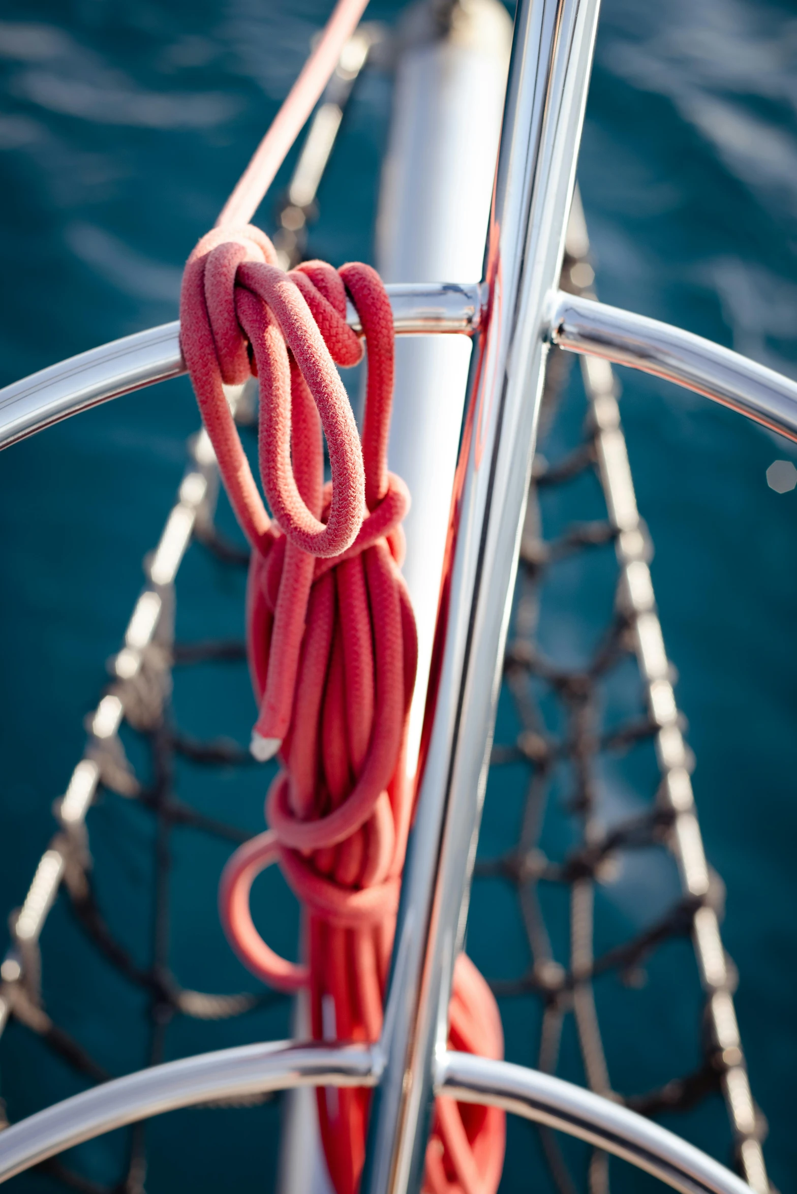 some ropes that are tied to a ship by a buoy