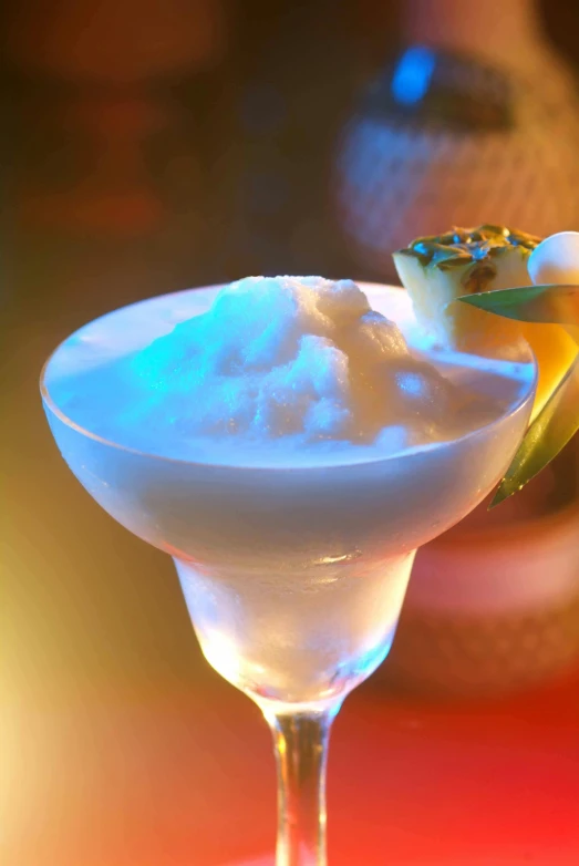 a close up of a drink with ice on top