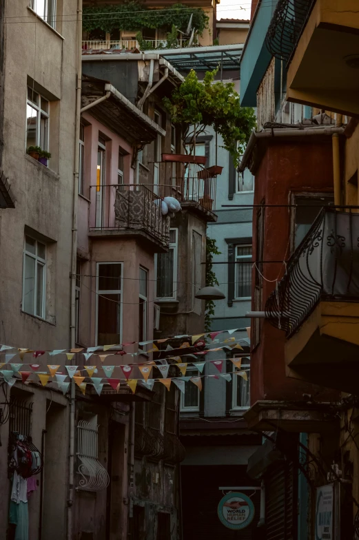 looking up at a group of buildings with balconies