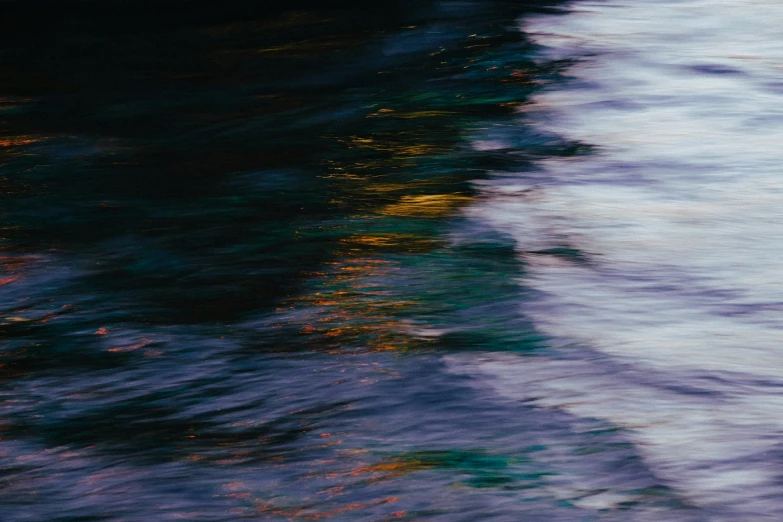 a surfer riding a wave on the ocean