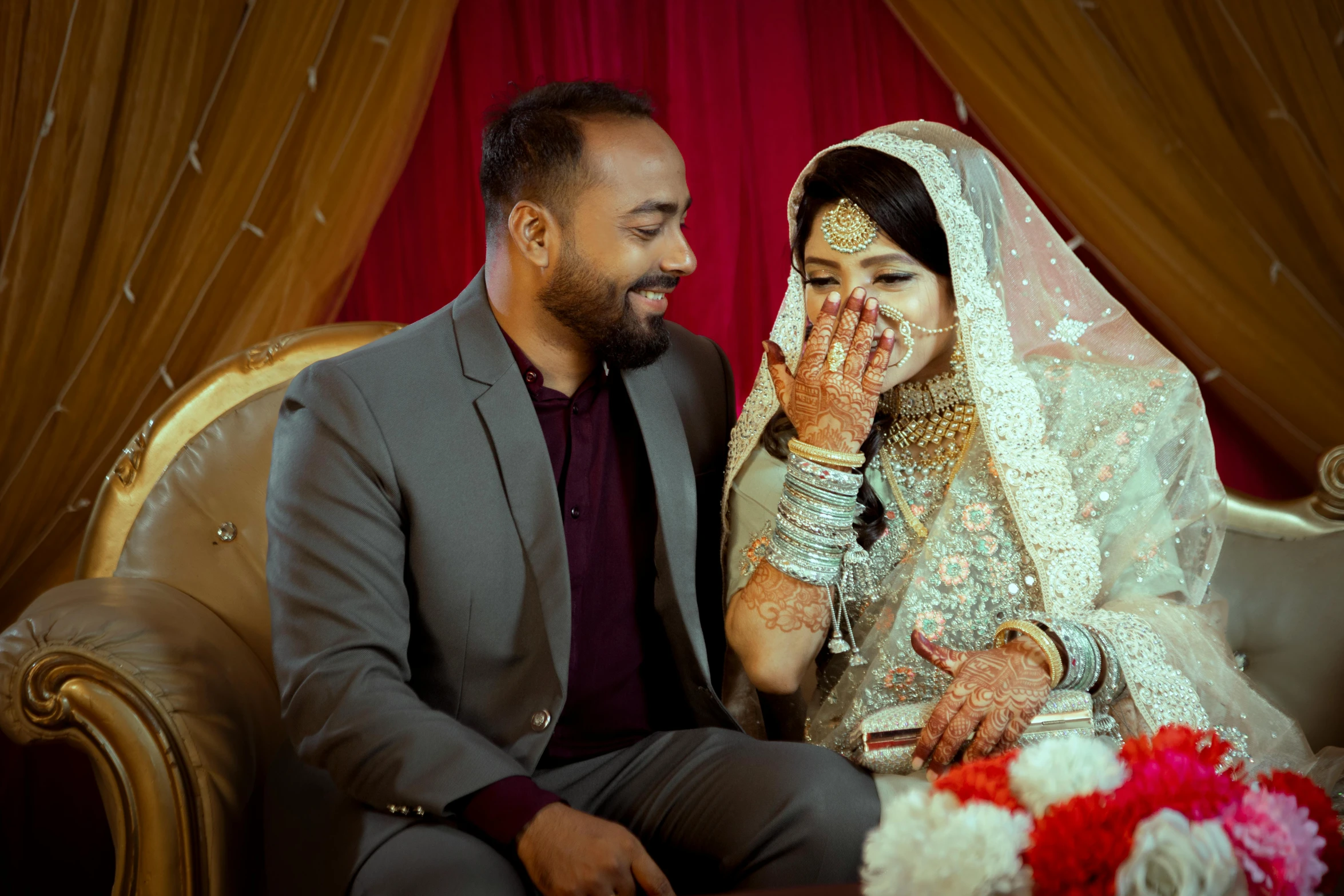 the bride and groom are smiling at each other