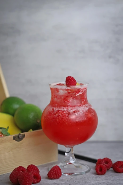 raspberry lemonade and lime on a table