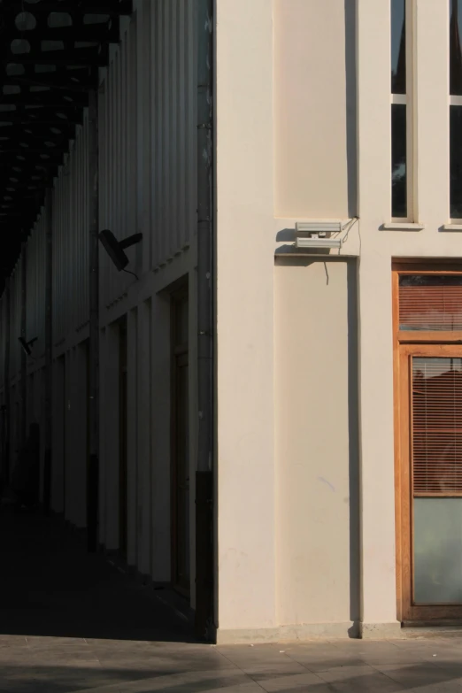 a window and blinds on an old building