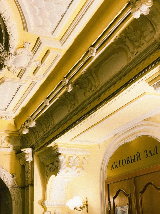 an ornate doorway that leads to another building