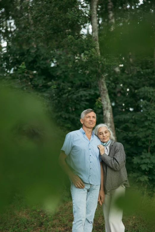 a man and woman pose for a picture