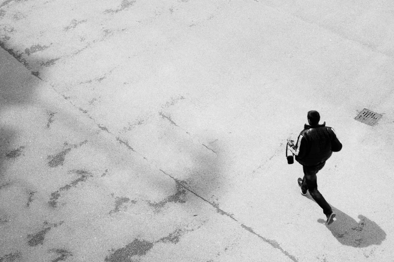 this is an aerial view of people walking and using cellphones