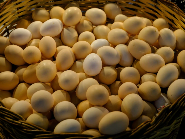 a basket filled with small round white objects