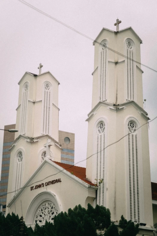 three church spires on top of a building