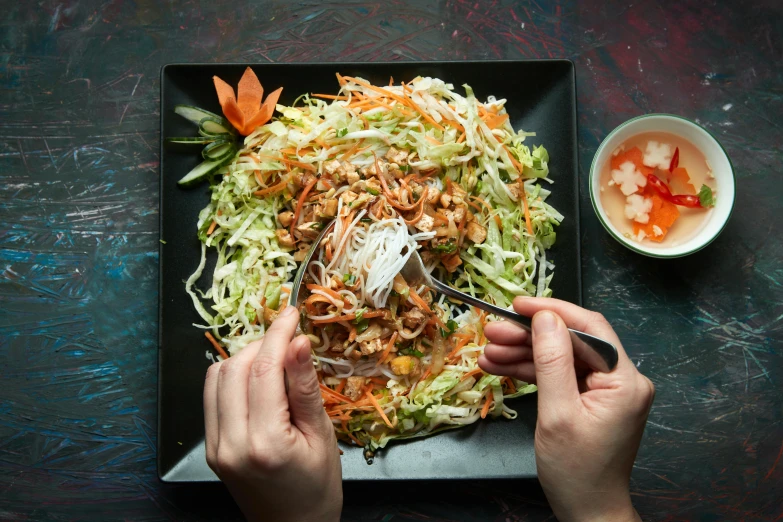 a person  up soing on top of a plate