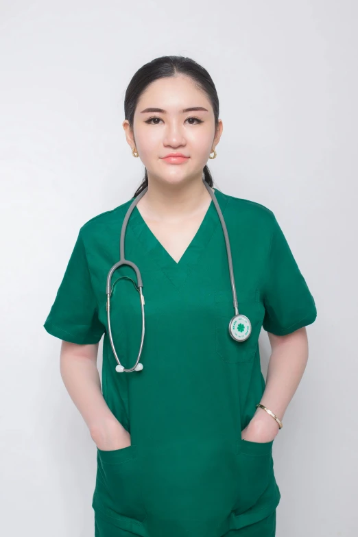 an image of a woman in scrubs and wearing a medical suit