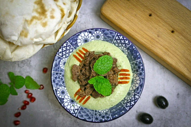 there is food that looks like meat and fruit on a plate