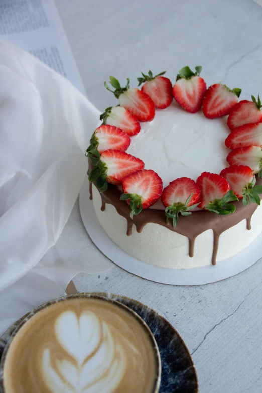 a piece of cake with chocolate and strawberries in the middle