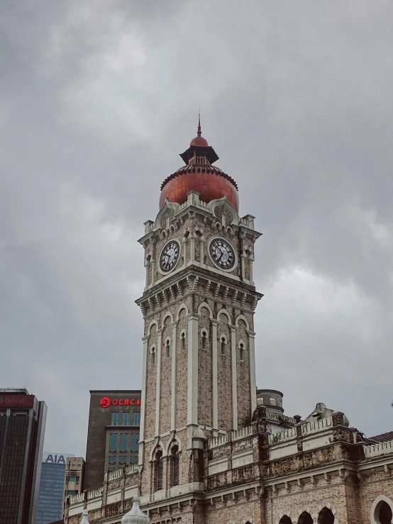 there is a very large tower with two clocks on it