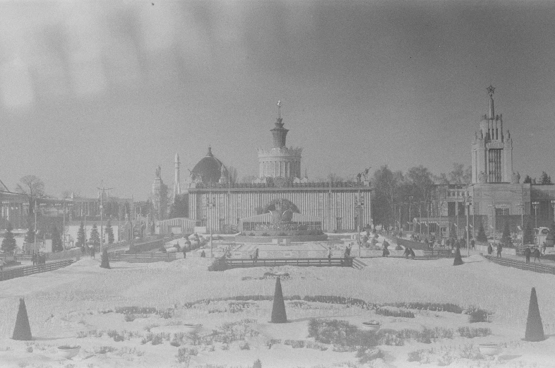 a black and white po with tall buildings