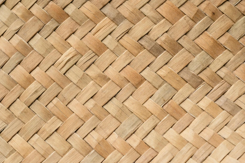 a piece of wood with weaved design