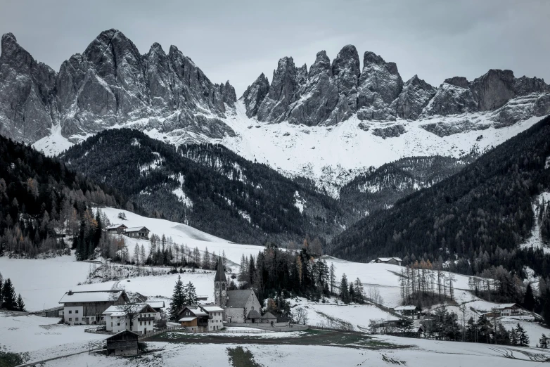 a scenic view of mountains with trees on the hillside