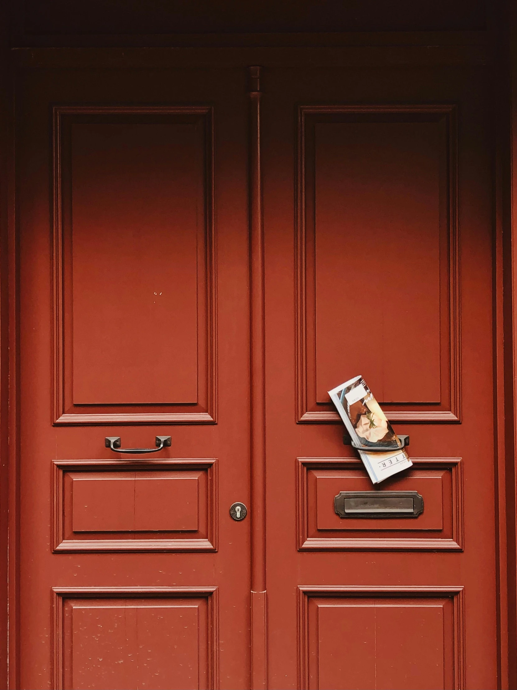 a close up of the front door of an apartment