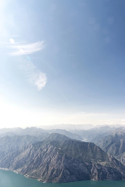 a large body of water in the middle of mountains