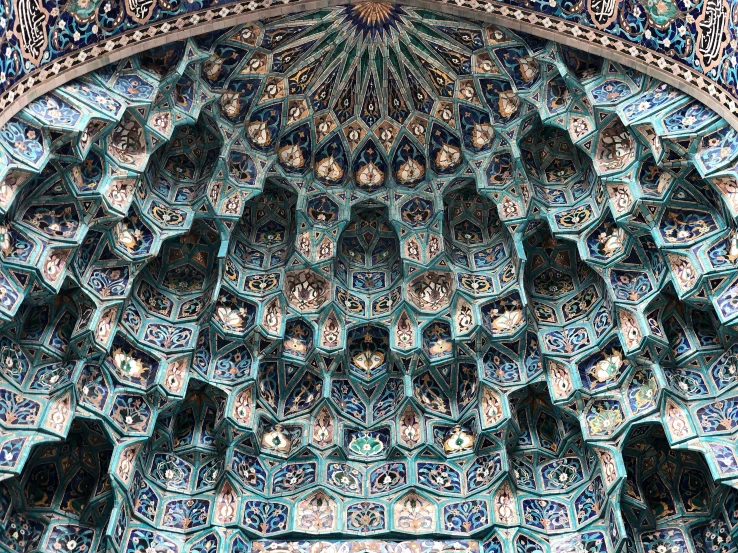 the intricately decorated ceiling of a building