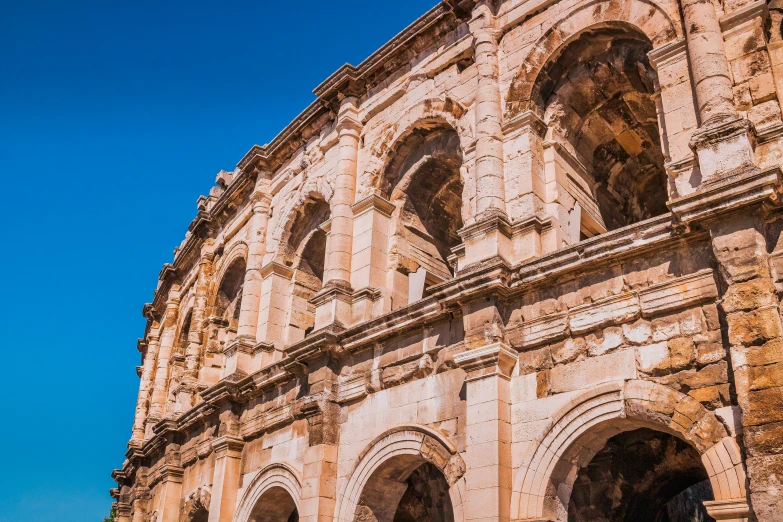 the ruins of a building near an ancient structure