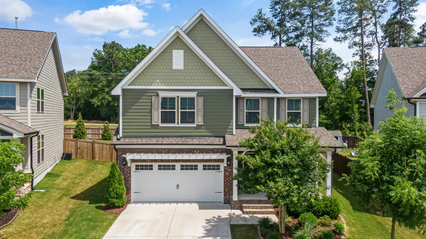 the exterior of a new, single family home located in suburbs