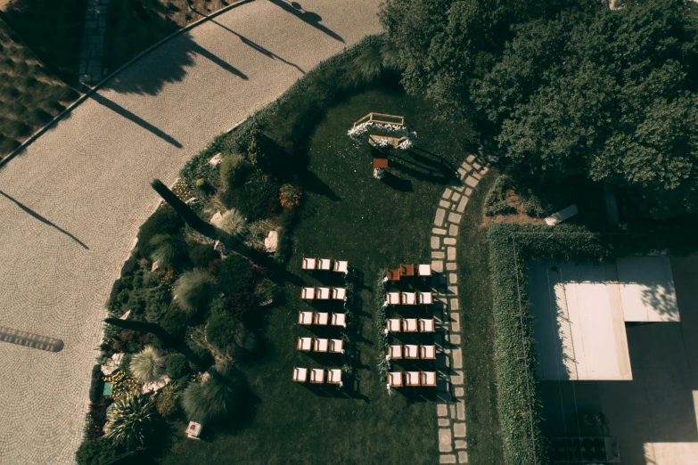 an overhead view of tables at a garden wedding venue