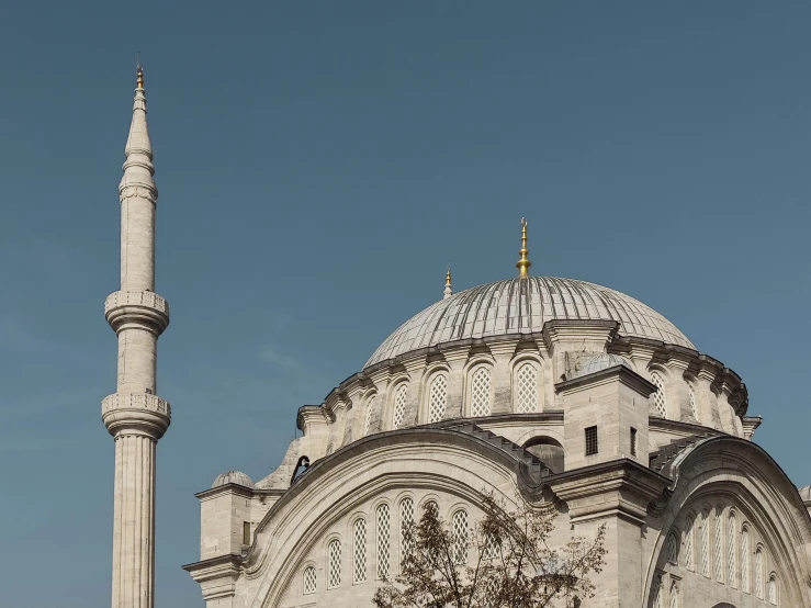 the side view of an old, ornate building with a dome