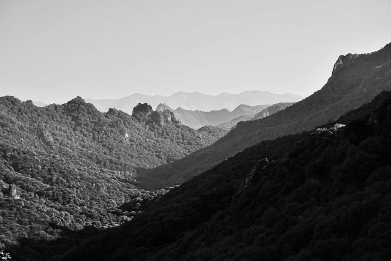 black and white po of mountains and valleys