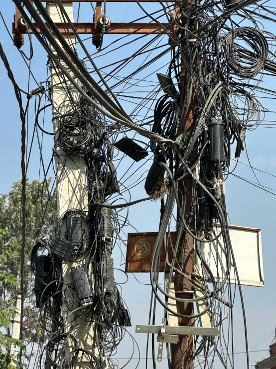 a power pole with multiple wires connected to it