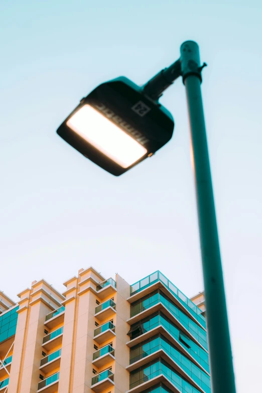 a street lamp that is standing next to a building