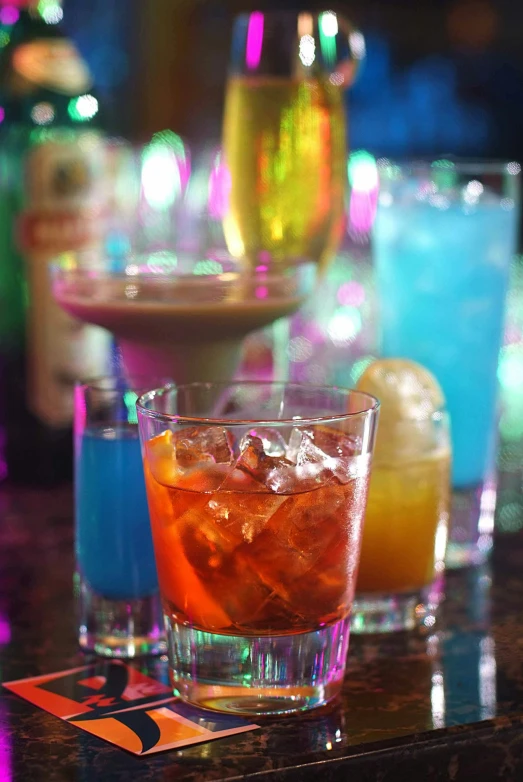 three different types of alcohol are shown on the counter