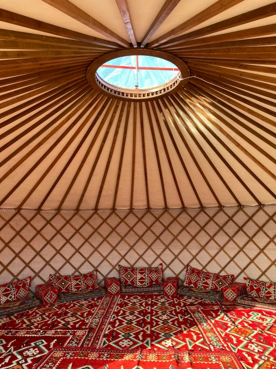 a yuse tent with an indoor seating area