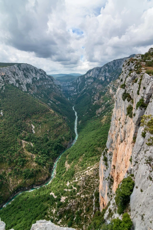 a view from a high cliff of two canyons