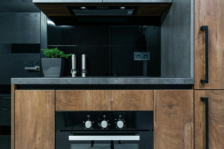 a black stove and oven inside a room
