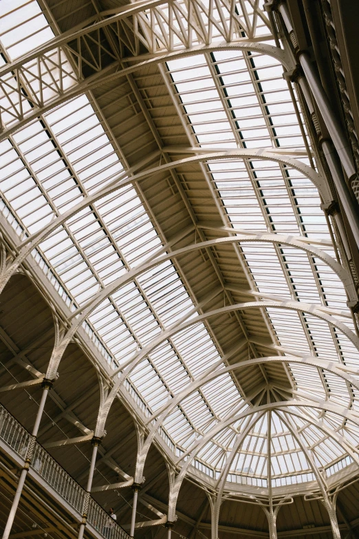 a large metal roof above a lobby area